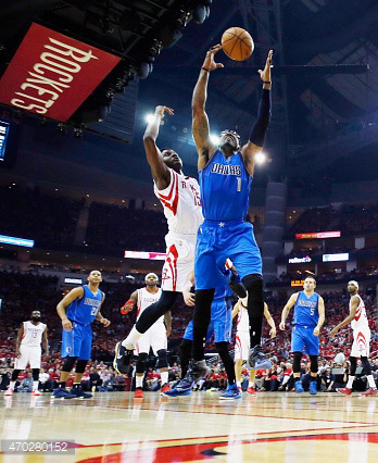 James Harden #13 of the Houston Rockets battles for a rebound with Rajon Rondo #9 of the Dallas Mavericks during Game One in the Western Conference Quarterfinals of the 2015 NBA Playoffs on April 18, 2015 at the Toyota Center in Houston, Texas. NOTE TO USER: User expressly acknowledges and agrees that, by downloading and/or using this photograph, user is consenting to the terms and conditions of the Getty Images License Agreement. (Photo by Scott Halleran/Getty Images) *** Local Caption *** James Harden; Rajon Rondo